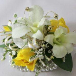 Corsage with Yellow Roses and white mini orchids